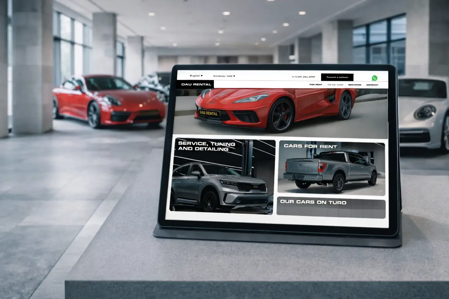 DAU Rental website on a tablet in a car showroom - research and structure for a Toronto car rental business